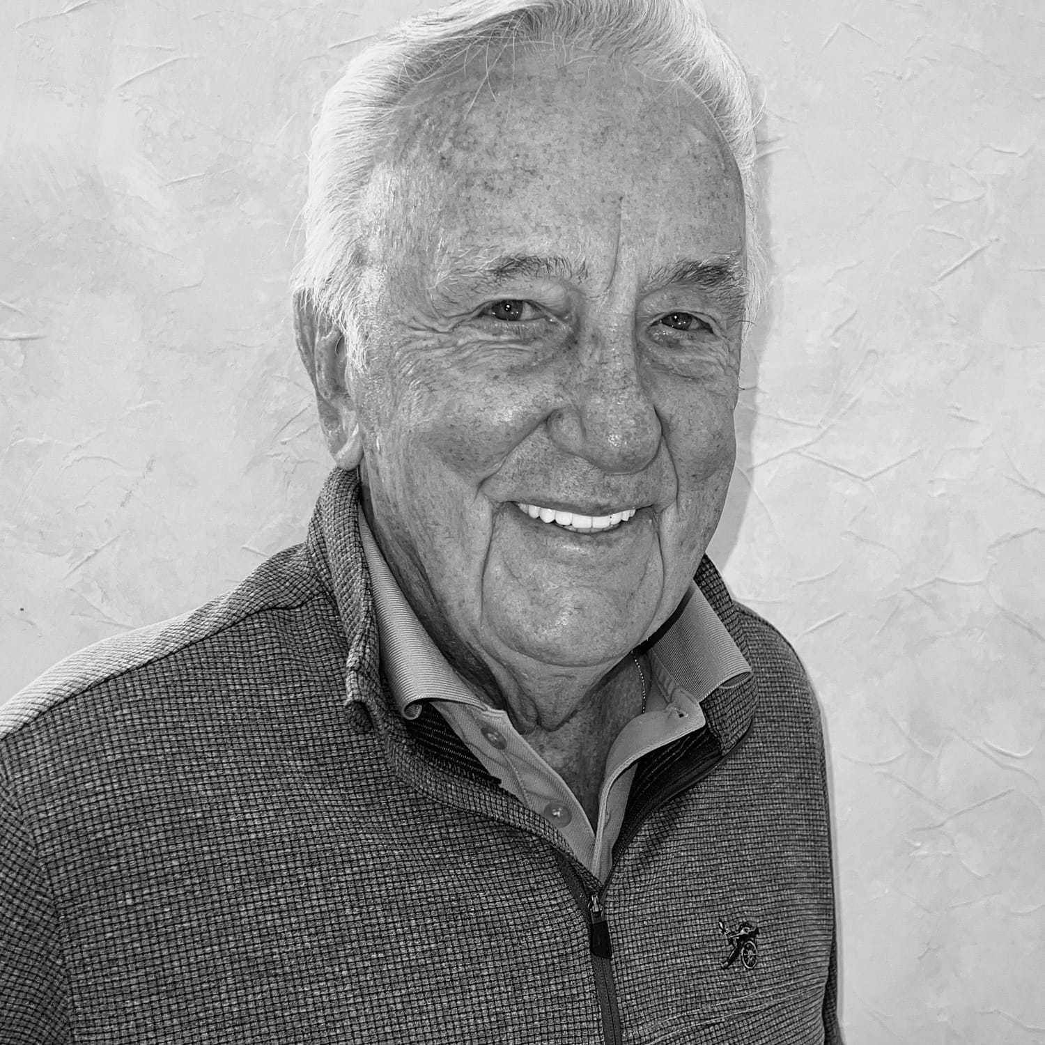 Portrait of Robert Zupko, a professional stylist at The Robert Andrew Salon & Spa Collection, showcasing their expertise and style.