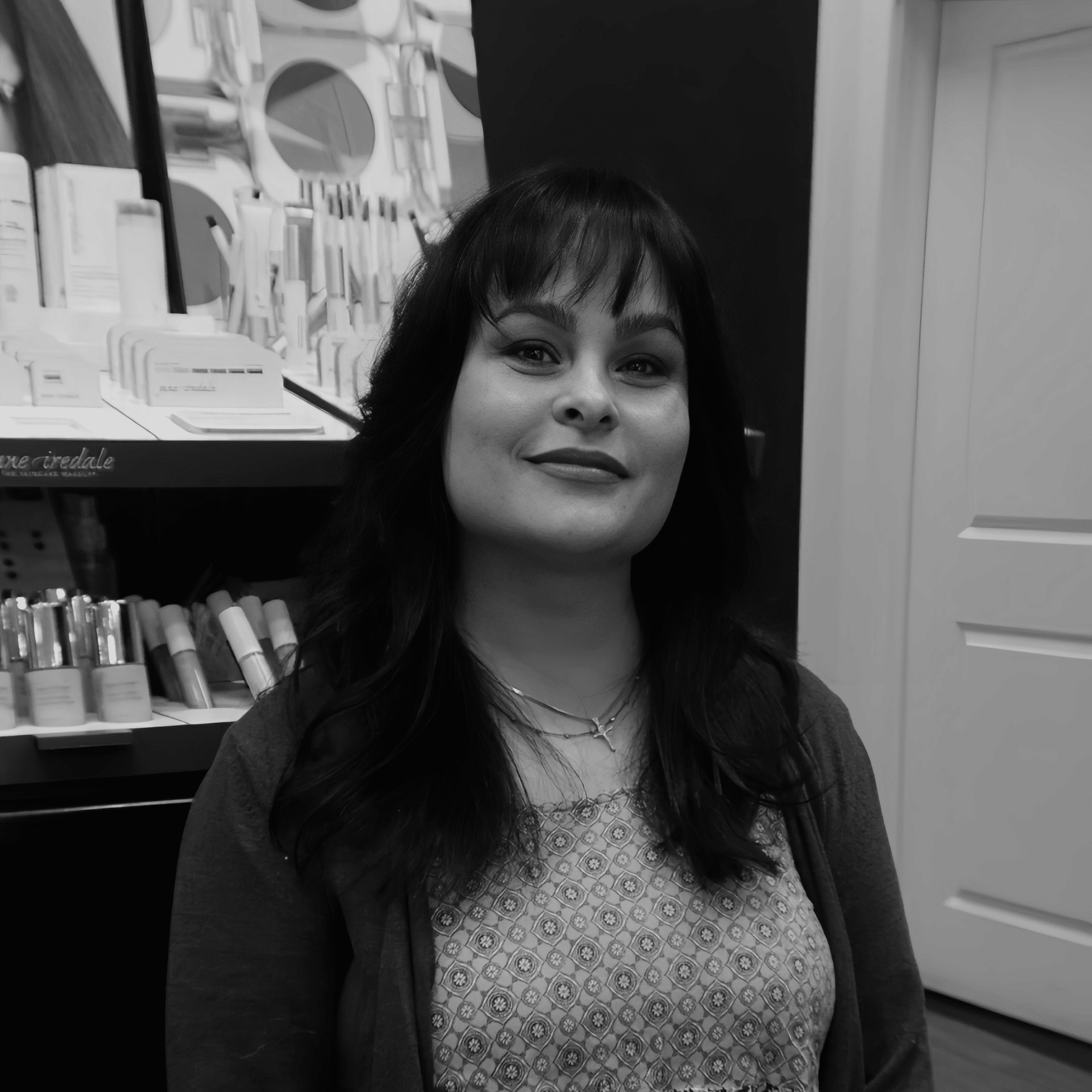 Portrait of Stacy Garcia-Salee, a professional stylist at Yacht Club Salon, showcasing their expertise and style.