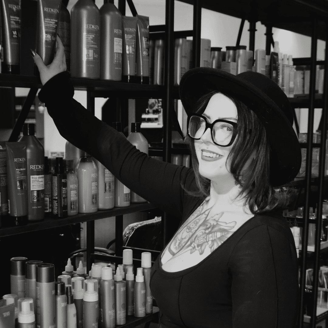 Portrait of Megan King, a professional stylist at Yacht Club Salon, showcasing their expertise and style.