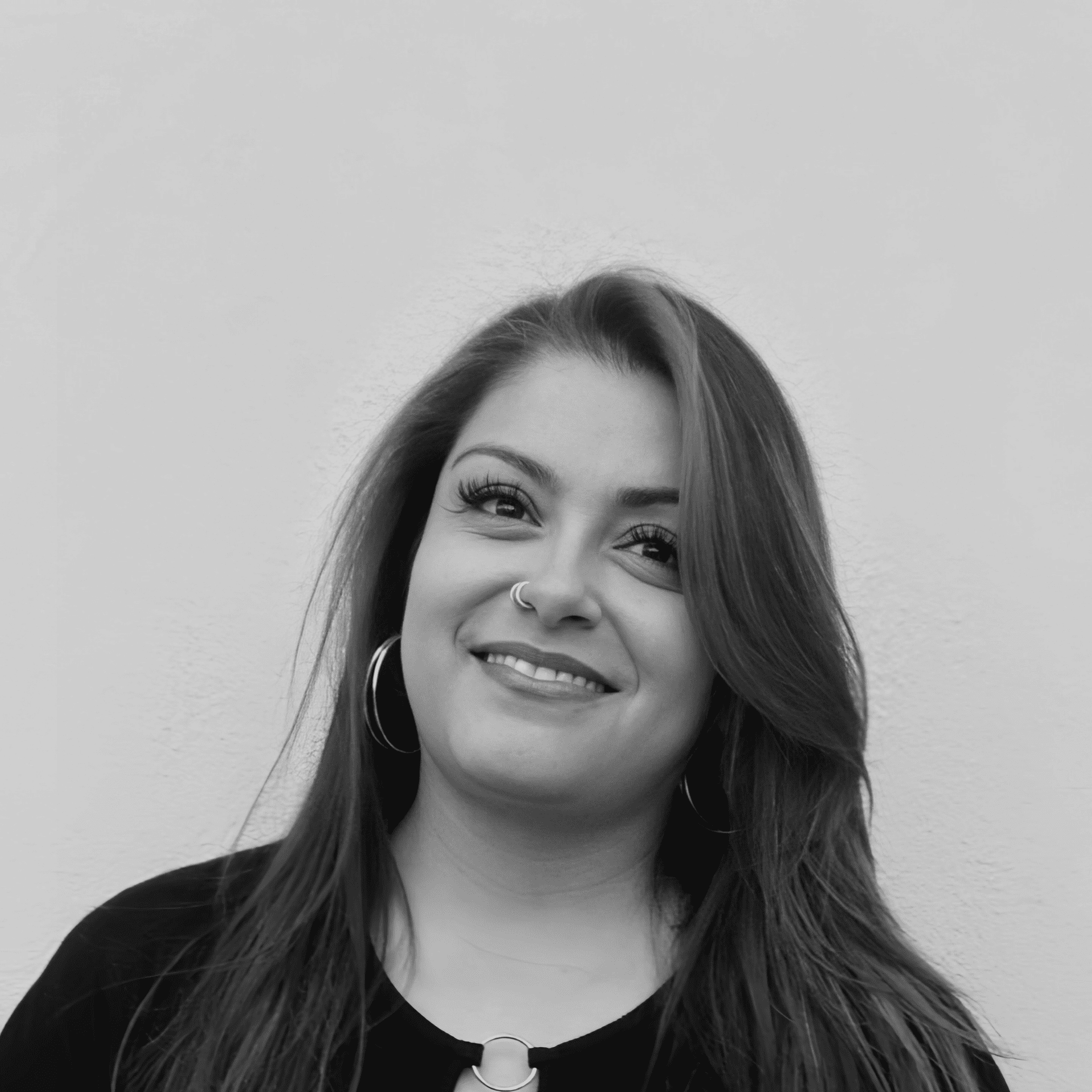 Portrait of Chantel Quintana, a professional stylist at Yacht Club Salon, showcasing their expertise and style.